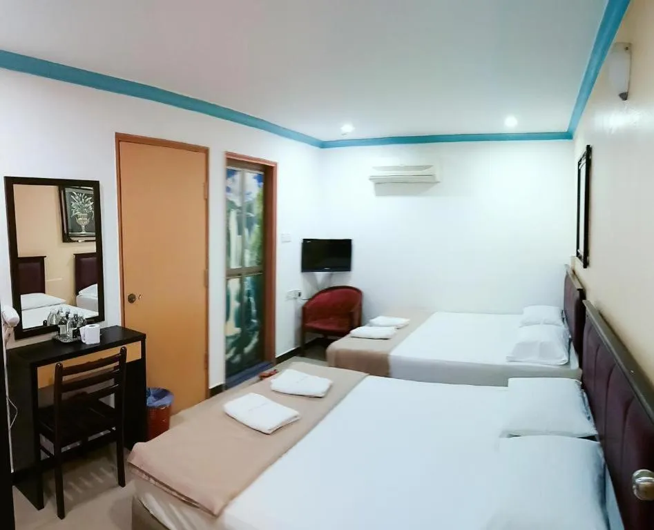 Bed in Twin Star Hotel