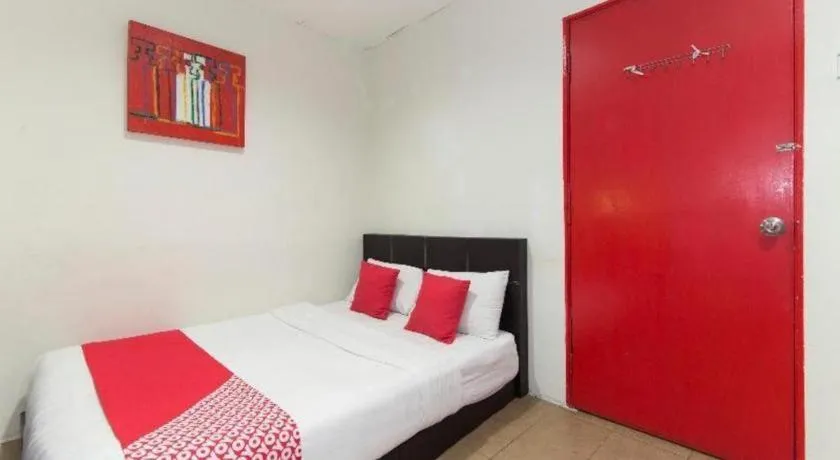 Bed in OYO 304 Zero Hour Hotel