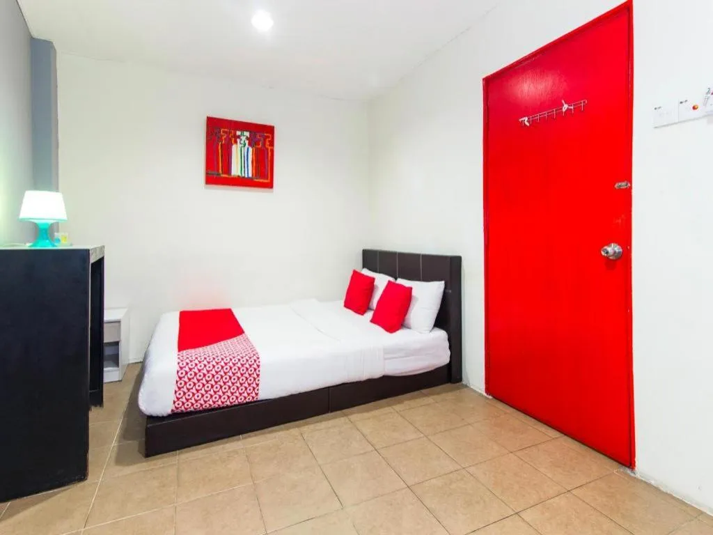 Bed in OYO 304 Zero Hour Hotel