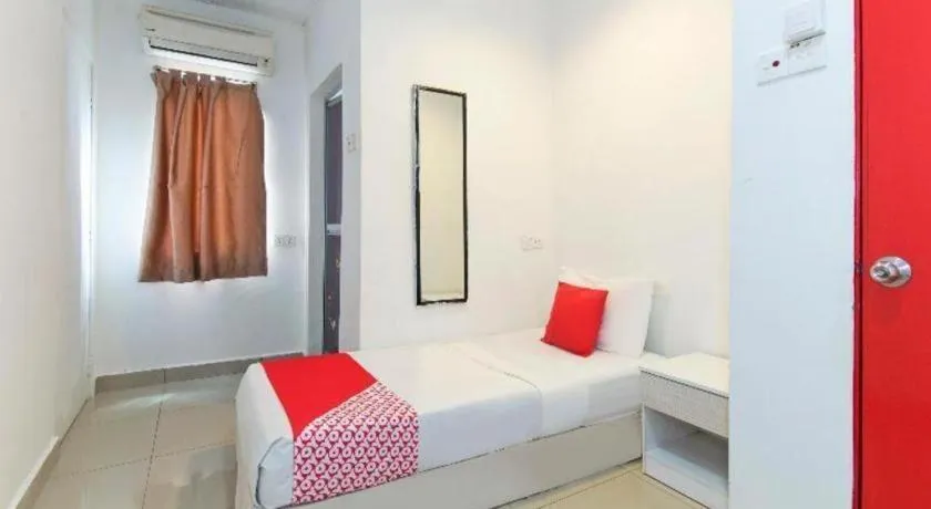 Bed in OYO 304 Zero Hour Hotel