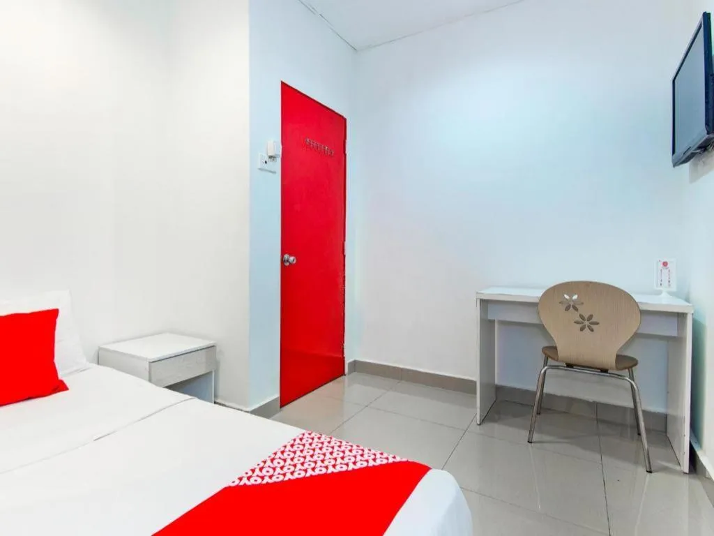 Bed in OYO 304 Zero Hour Hotel