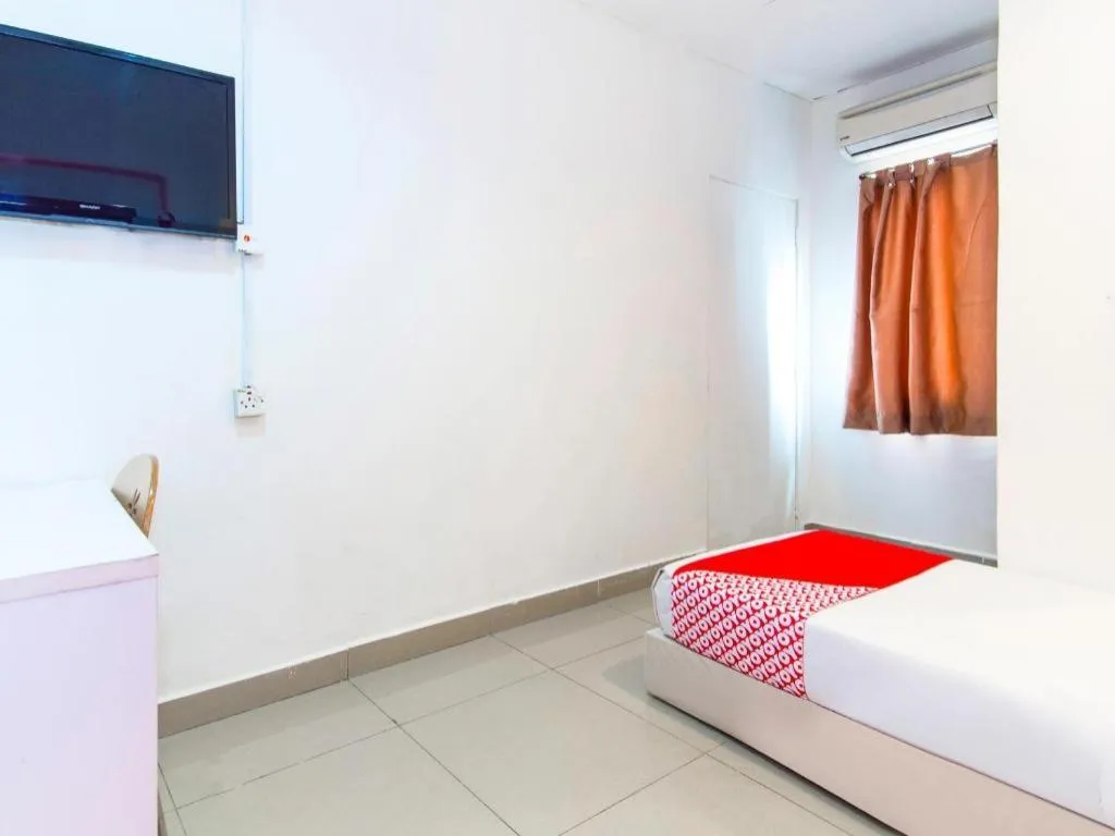 Bed in OYO 304 Zero Hour Hotel