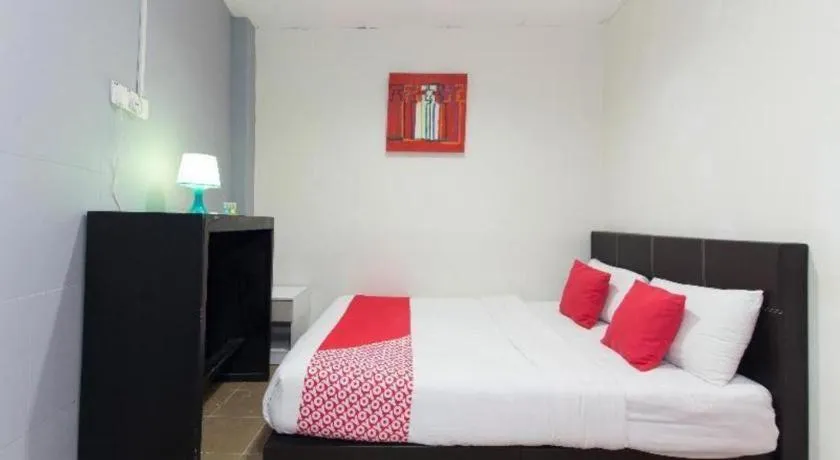 Bed in OYO 304 Zero Hour Hotel