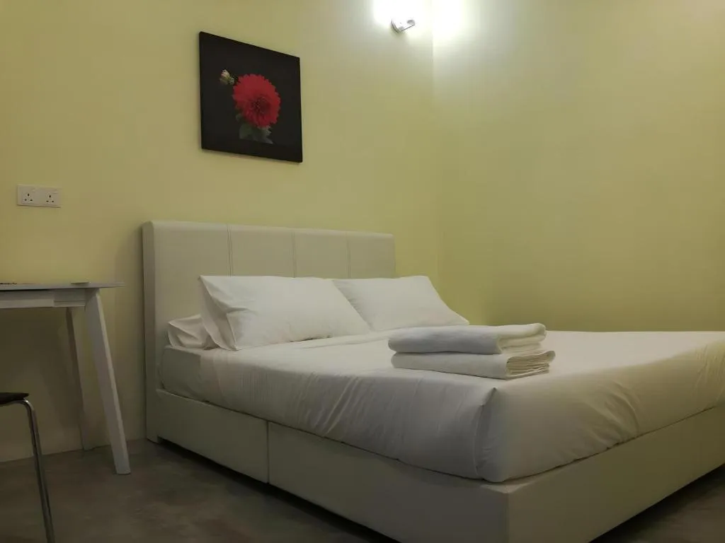 Bed in Hotel Pangkor Mutiara