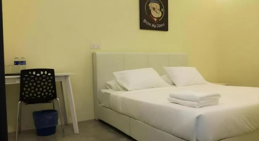 Bed in Hotel Pangkor Mutiara