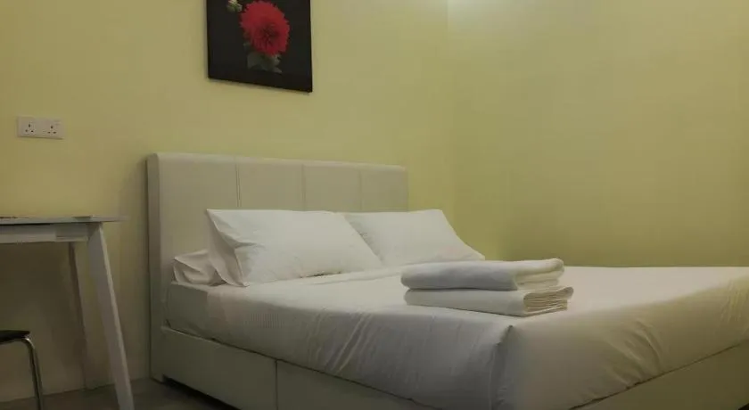 Bed in Hotel Pangkor Mutiara