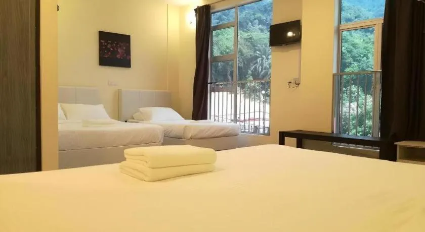 Bed in Hotel Pangkor Mutiara