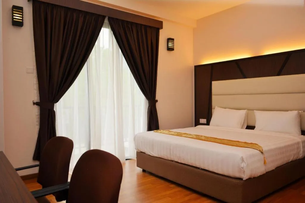 Bed in Hotel Grand Baron