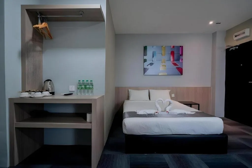 Bed in Kimal Hotel Taiping