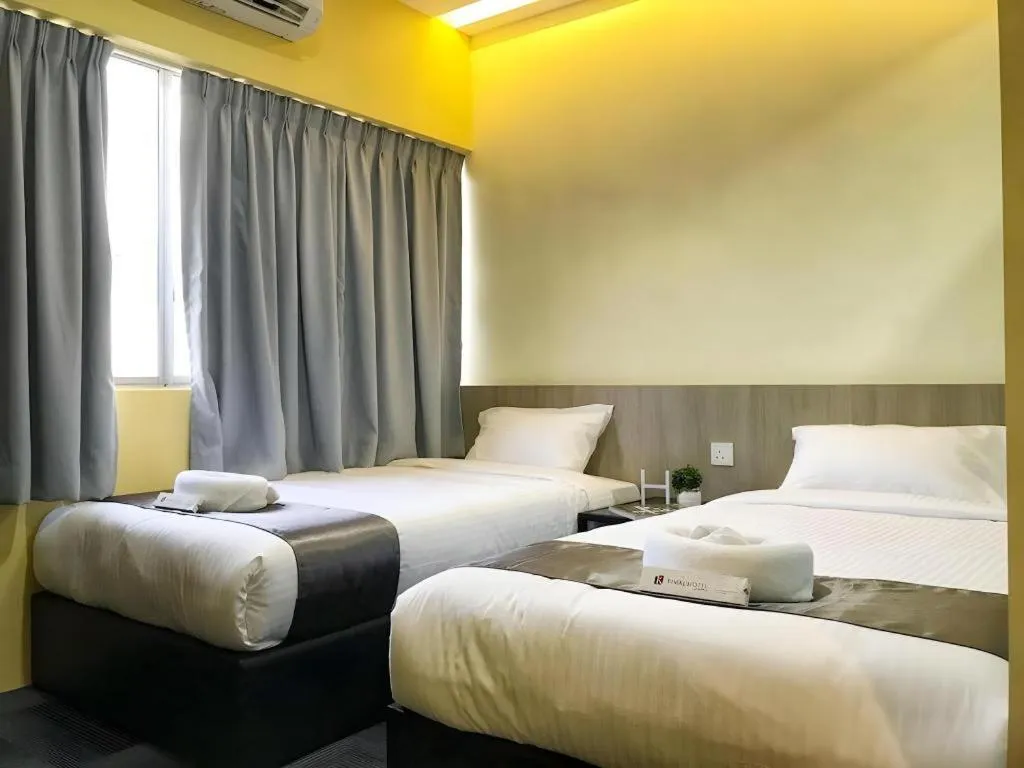 Bed in Kimal Hotel Taiping