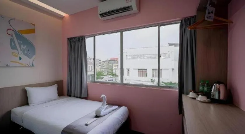 Bed in Kimal Hotel Taiping