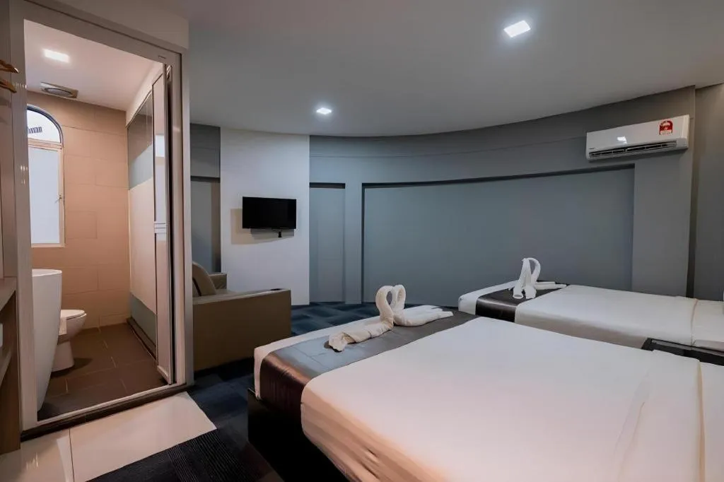 Bed in Kimal Hotel Taiping