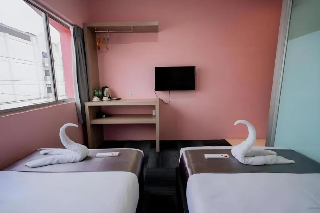 Bed in Kimal Hotel Taiping