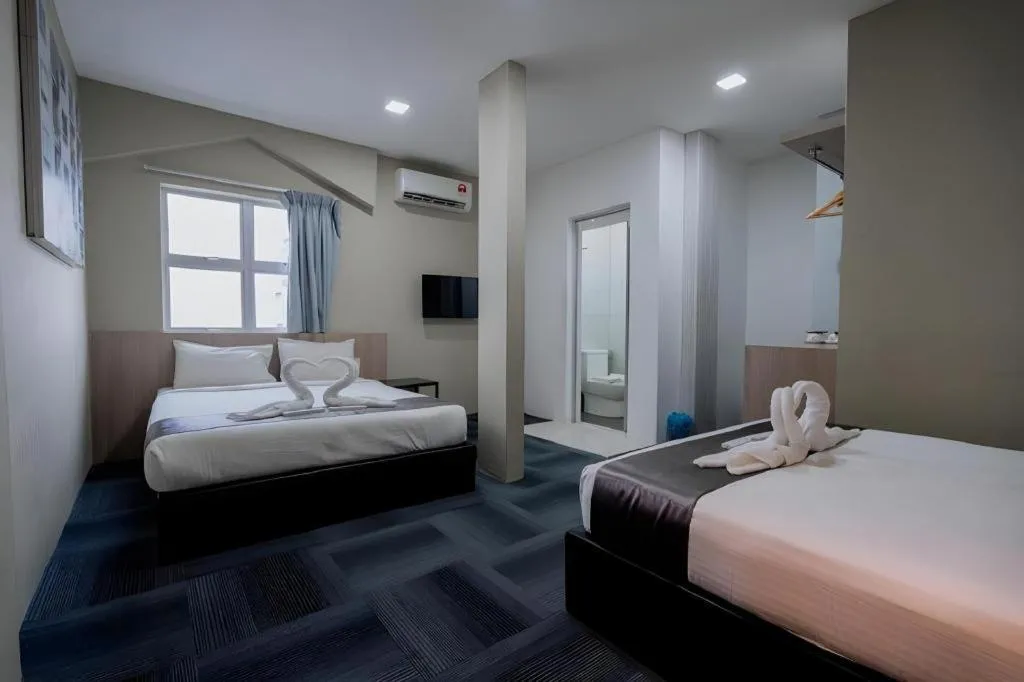 Bed in Kimal Hotel Taiping