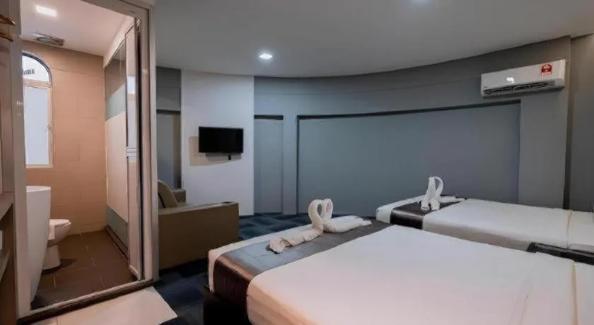 Bed in Kimal Hotel Taiping