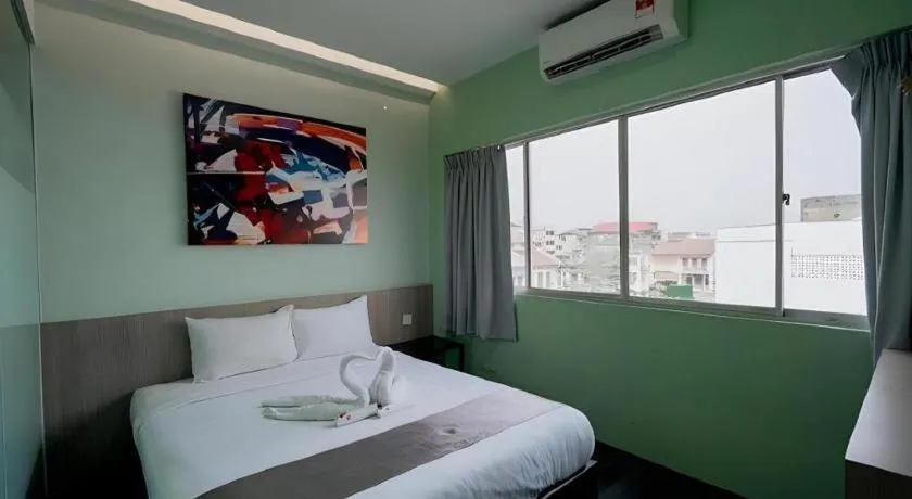 Bed in Kimal Hotel Taiping