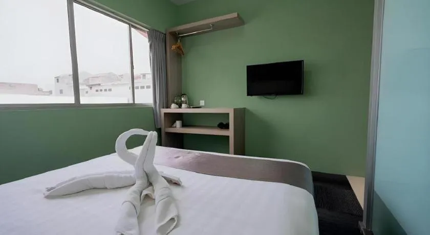 Bed in Kimal Hotel Taiping