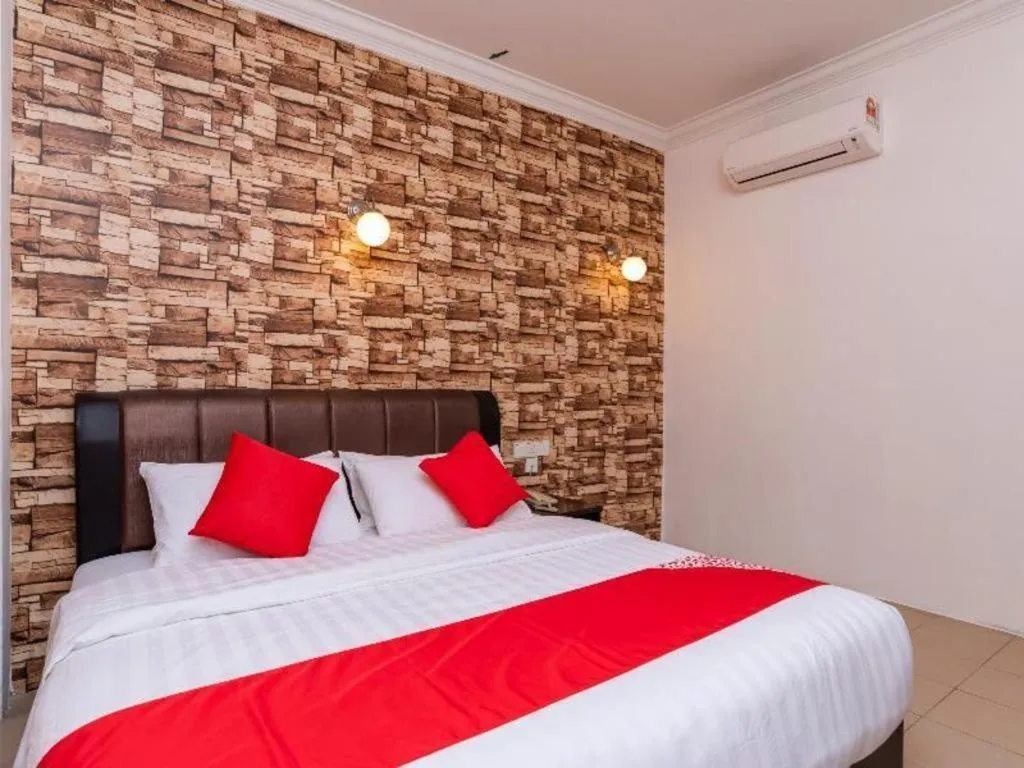 Bed in Super OYO 1114 Neo Pegasus Hotel