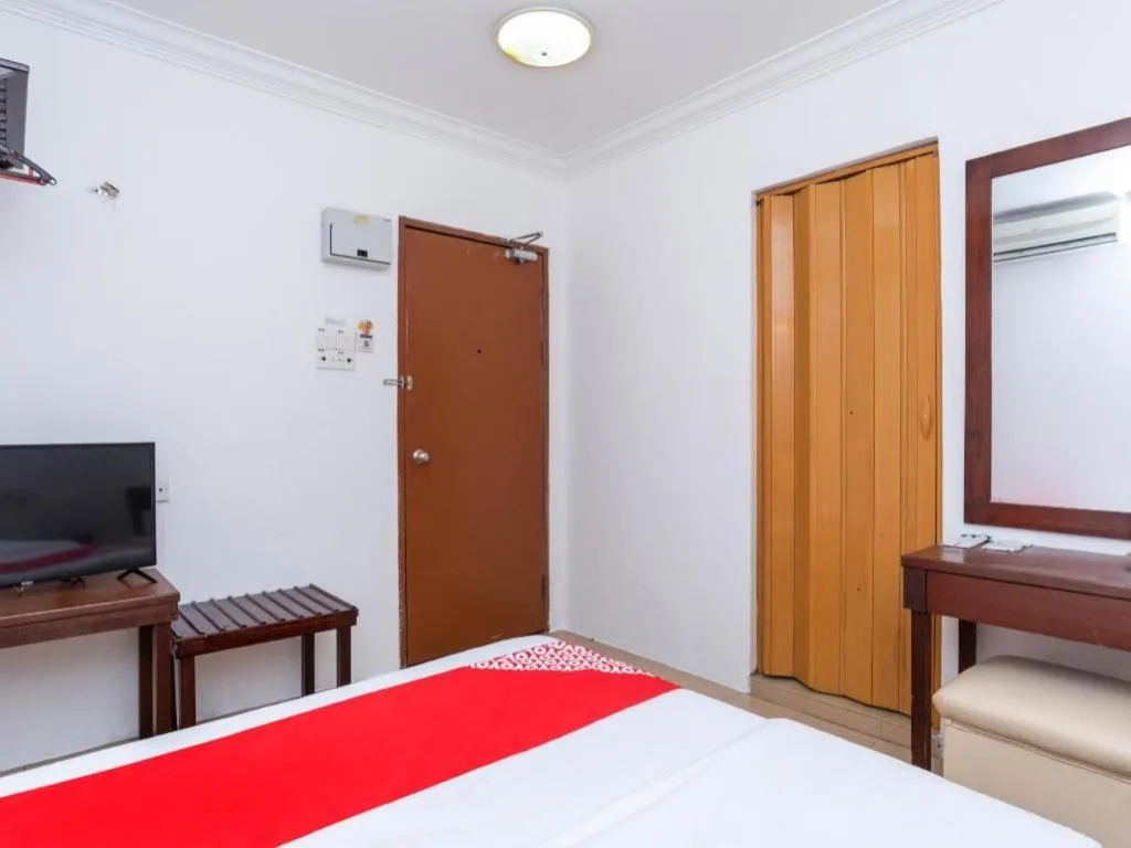 Bed in Super OYO 1114 Neo Pegasus Hotel