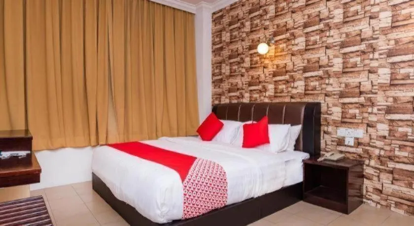 Bed in Super OYO 1114 Neo Pegasus Hotel