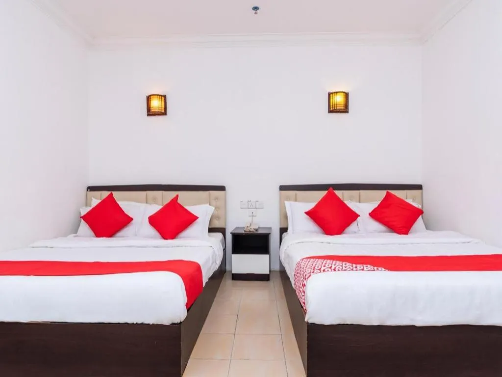 Bed in Super OYO 1114 Neo Pegasus Hotel