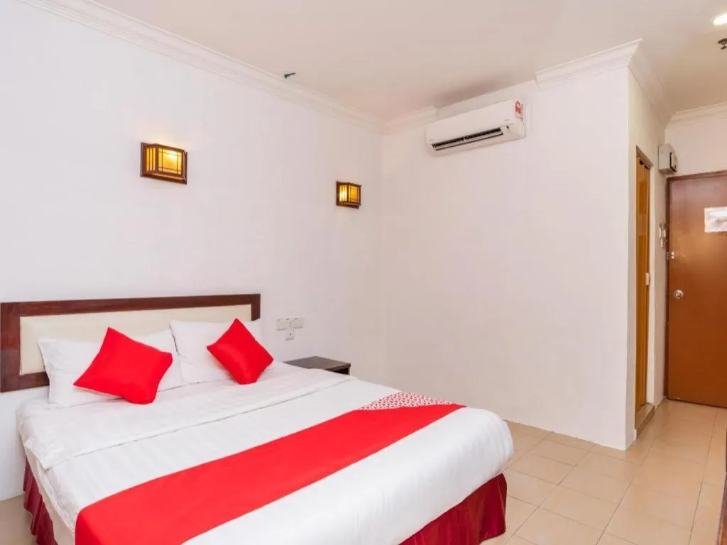 Bed in Super OYO 1114 Neo Pegasus Hotel