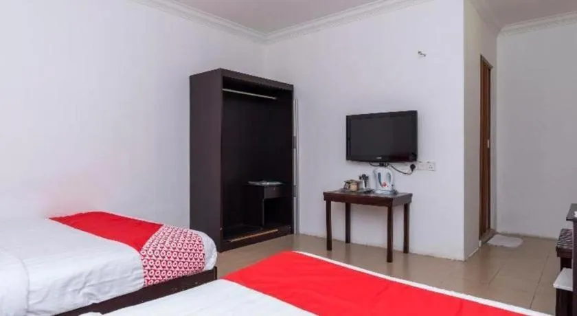 Bed in Super OYO 1114 Neo Pegasus Hotel