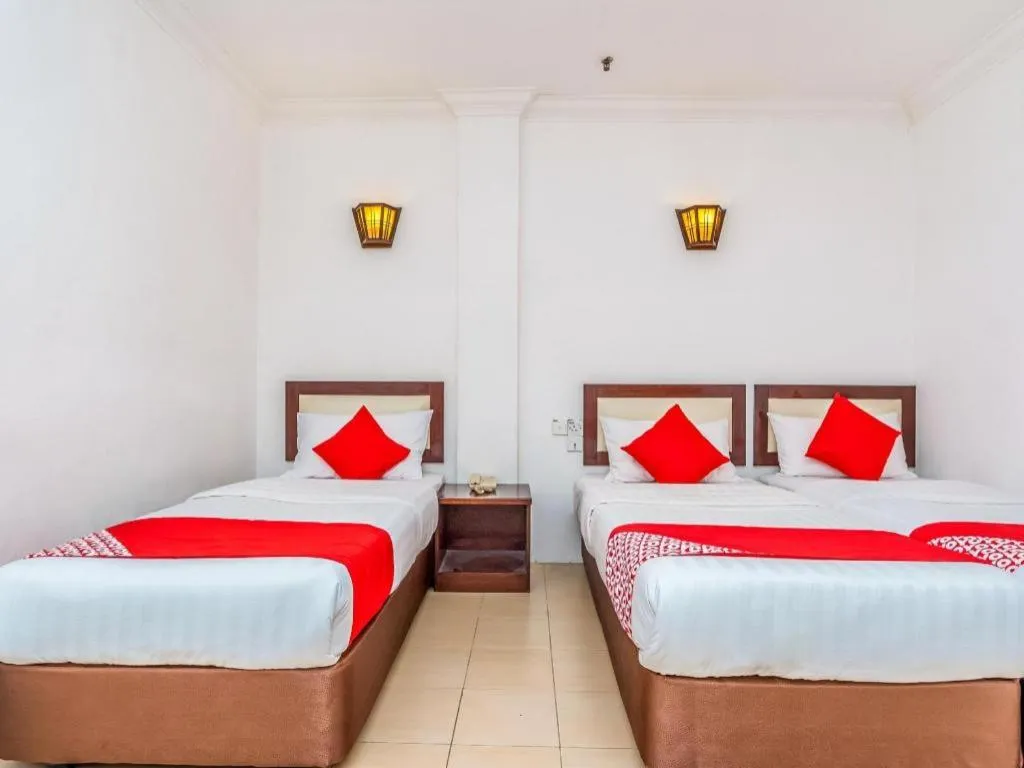 Bed in Super OYO 1114 Neo Pegasus Hotel