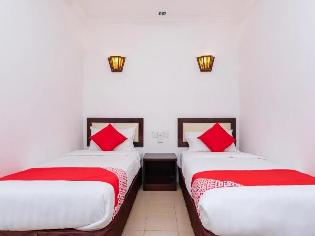 Bed in Super OYO 1114 Neo Pegasus Hotel