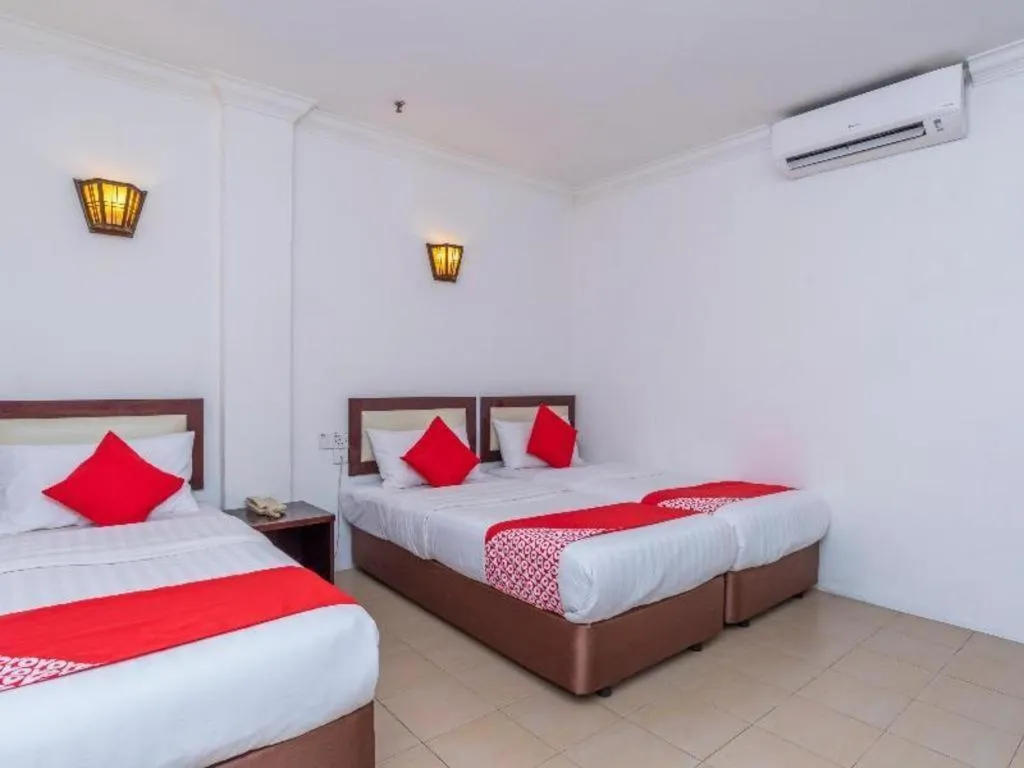 Bed in Super OYO 1114 Neo Pegasus Hotel