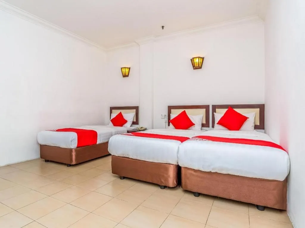 Bed in Super OYO 1114 Neo Pegasus Hotel