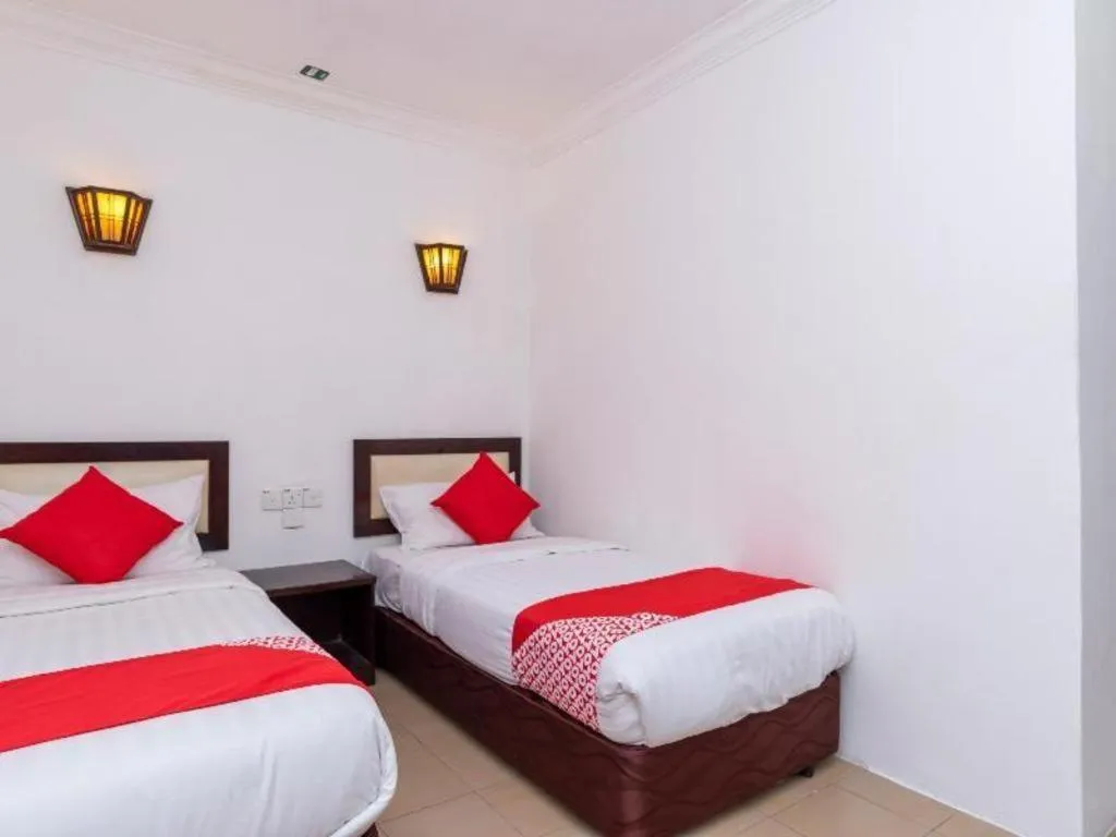 Bed in Super OYO 1114 Neo Pegasus Hotel