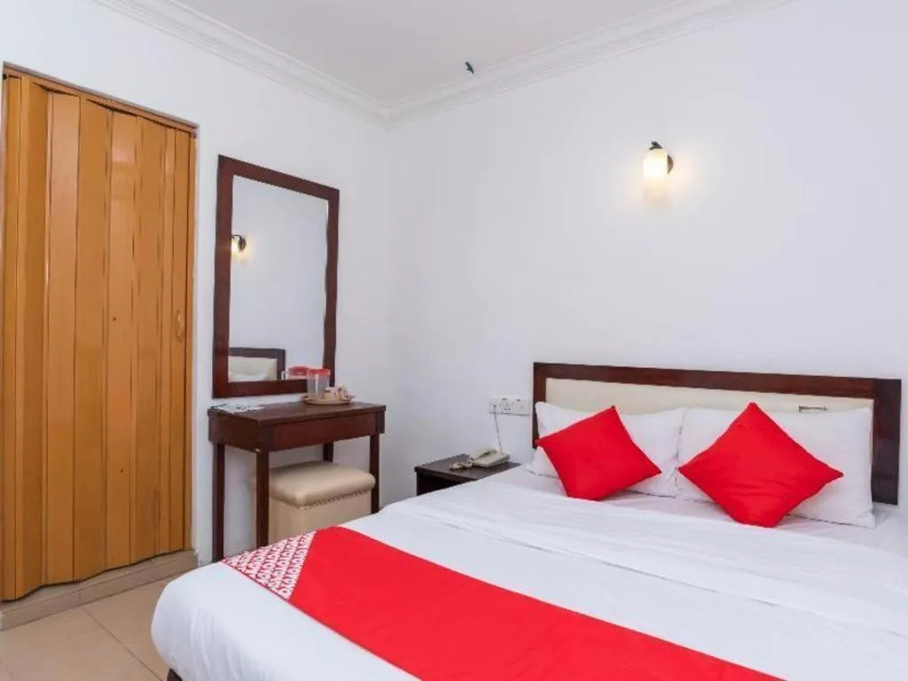 Bed in Super OYO 1114 Neo Pegasus Hotel