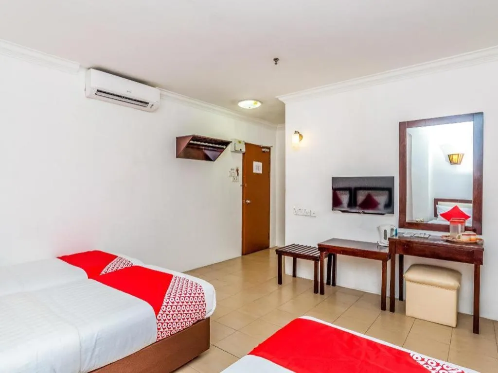 Bed in Super OYO 1114 Neo Pegasus Hotel