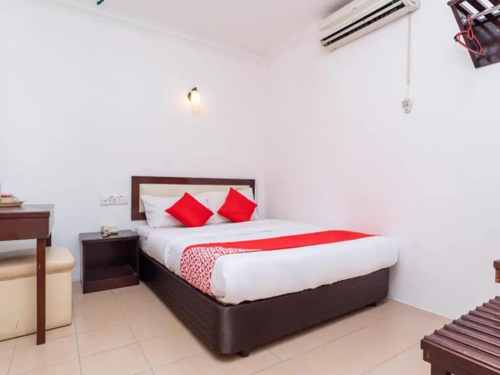 Bed in Super OYO 1114 Neo Pegasus Hotel