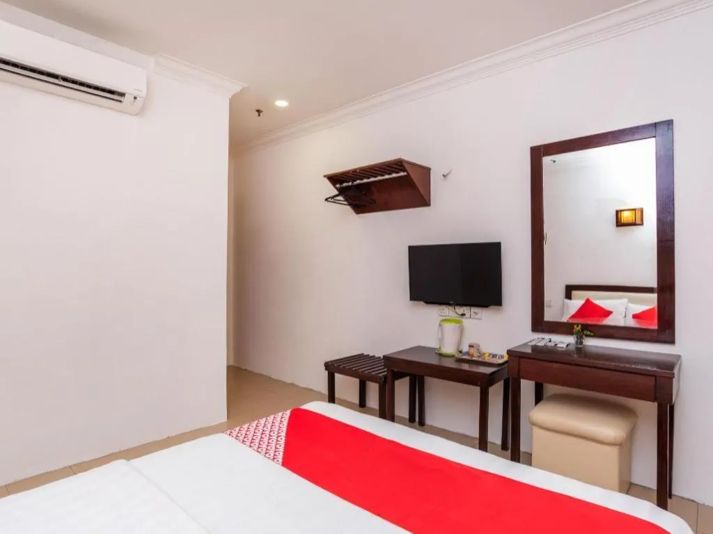 Bed in Super OYO 1114 Neo Pegasus Hotel