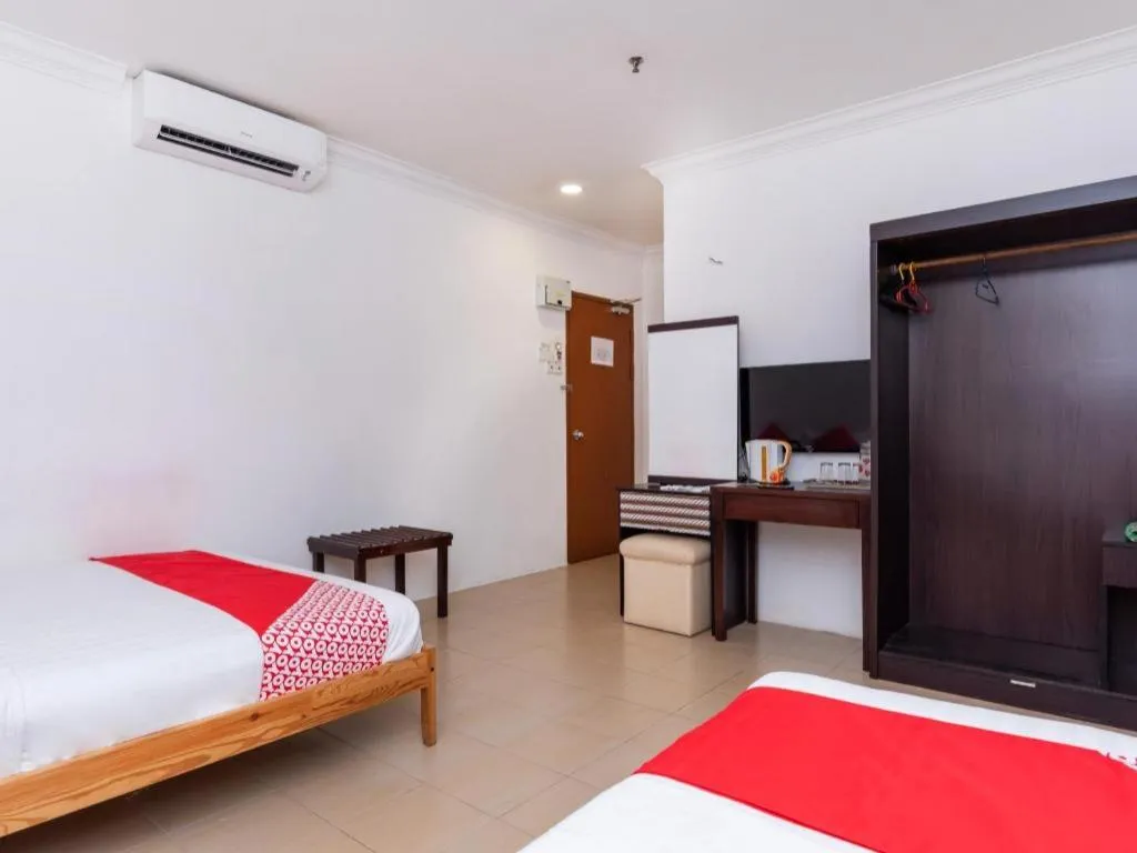 Bed in Super OYO 1114 Neo Pegasus Hotel