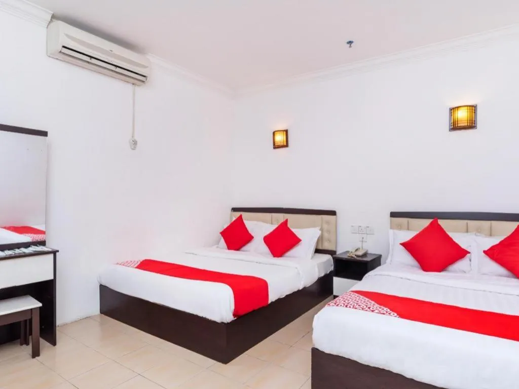 Bed in Super OYO 1114 Neo Pegasus Hotel