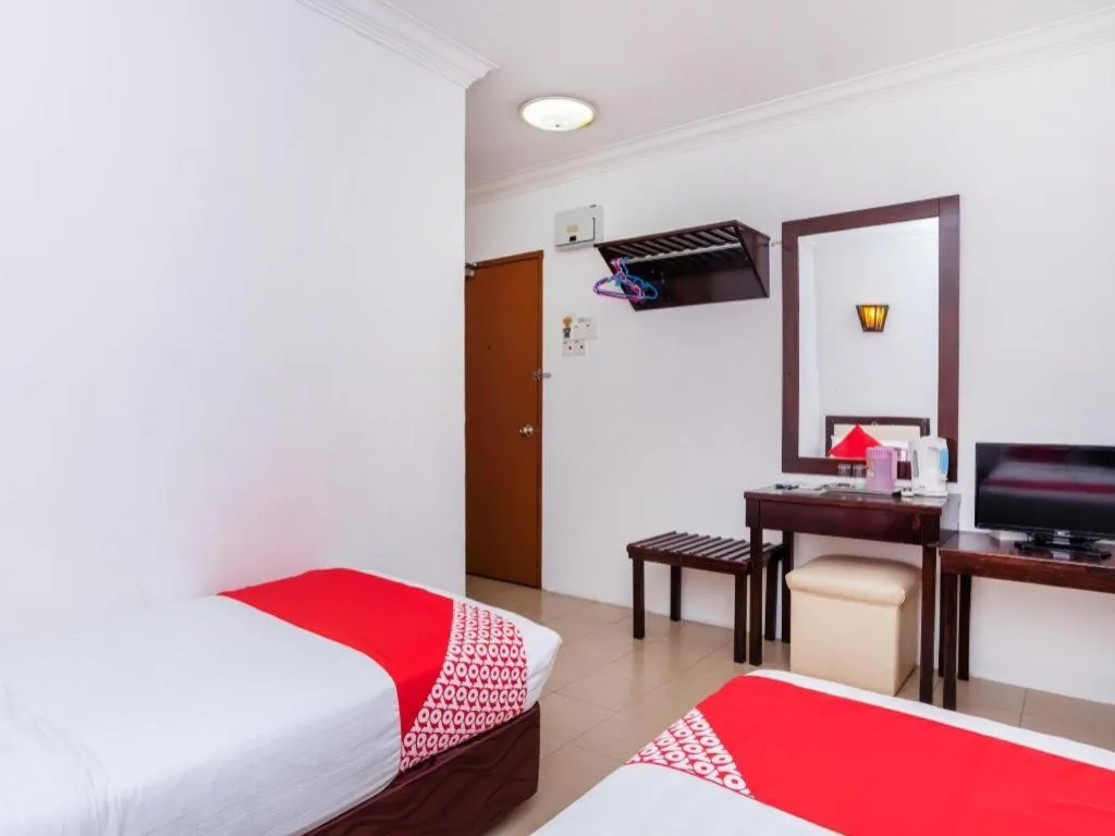 Bed in Super OYO 1114 Neo Pegasus Hotel