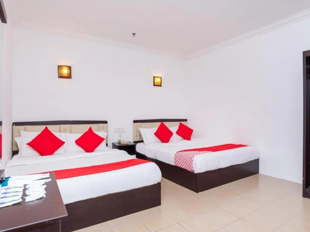 Bed in Super OYO 1114 Neo Pegasus Hotel