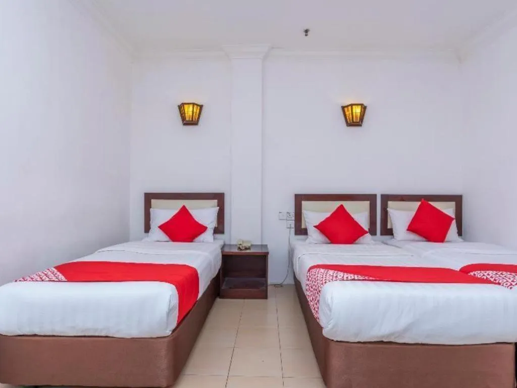 Bed in Super OYO 1114 Neo Pegasus Hotel