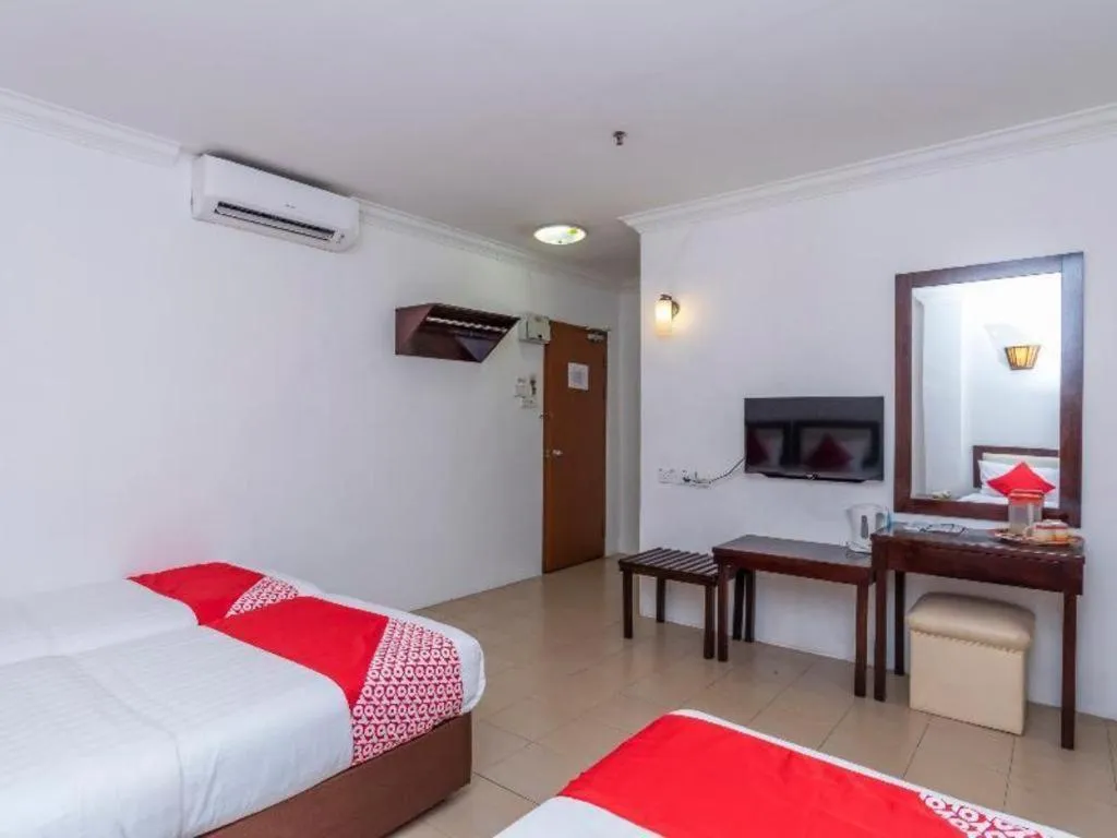 Bed in Super OYO 1114 Neo Pegasus Hotel