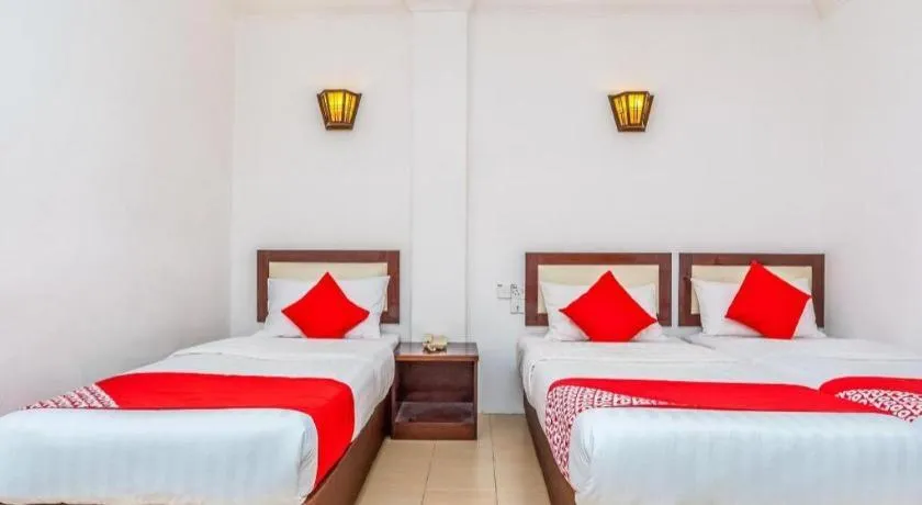 Bed in Super OYO 1114 Neo Pegasus Hotel