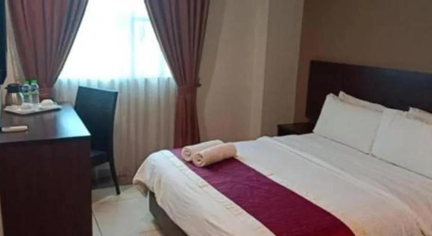 Bed in PPT Muar Hotel