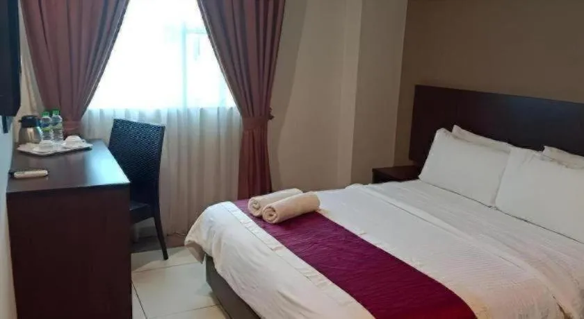 Bed in PPT Muar Hotel