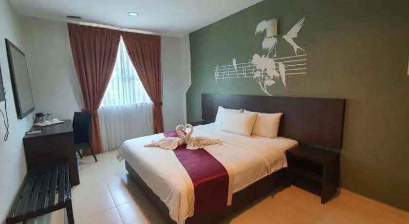 Bed in PPT Muar Hotel