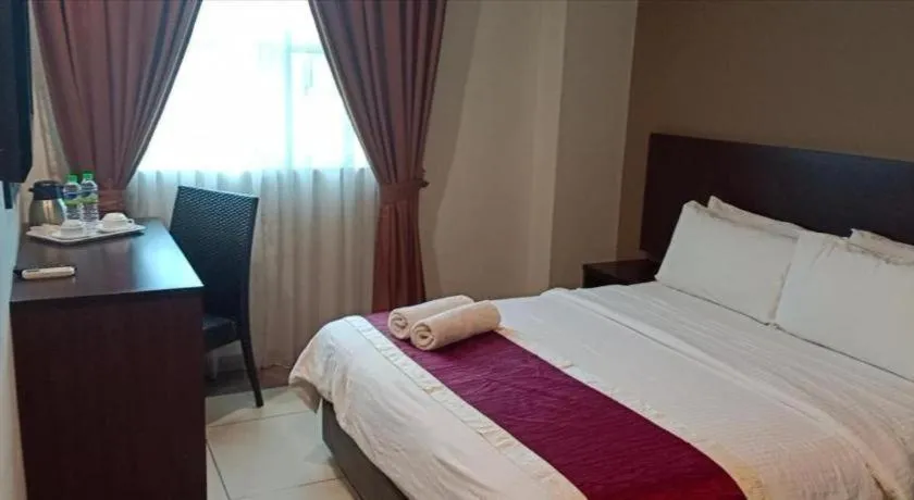 Bed in PPT Muar Hotel