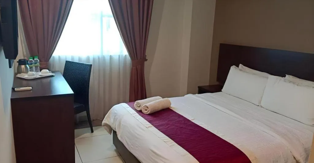 Bed in PPT Muar Hotel
