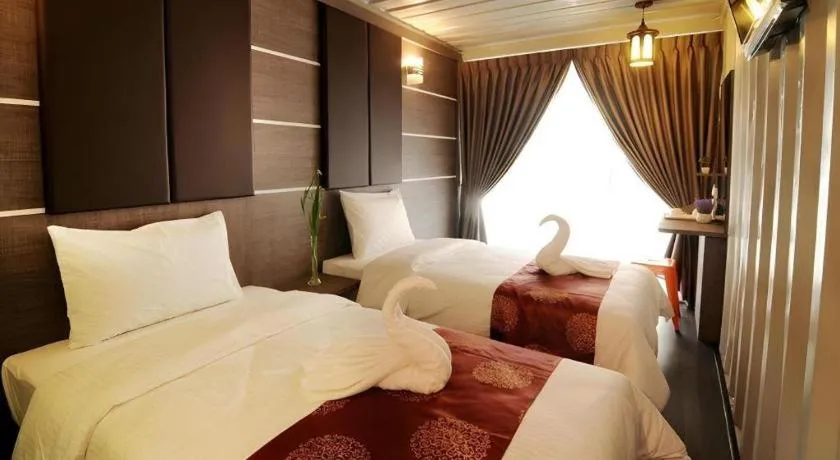 Bed in PPT Muar Hotel