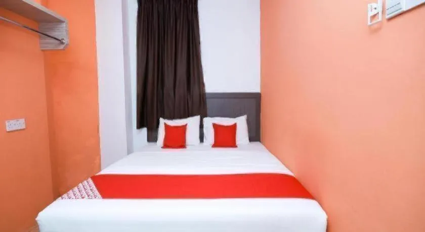 Bed in OYO 1111 Harmony Stay